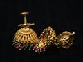 antique earrings called jhumkas made of gold