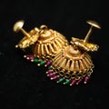 antique earrings called jhumkas made of gold