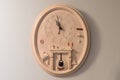 Antique earthen clock on wall