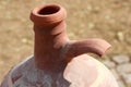 Antique, earthen water pot