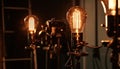 Antique electric lamp glowing yellow, illuminating modern glass drink indoors generated by AI