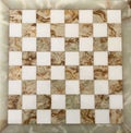 Antique and elegant Carrara marble chessboard. Italy. Marble board game. Top View