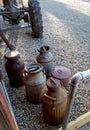 Antique farm dairy containers Royalty Free Stock Photo