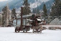 Antique farm equipment in winter Royalty Free Stock Photo