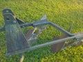 Antique farm plow in Florida countryside