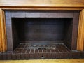 Antique fireplace painted in brown