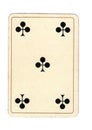 An antique five of clubs playing card. Royalty Free Stock Photo