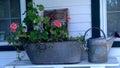 Antique flower box and watering can