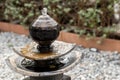 Antique fountain at garden. jar fountain in the garden. fountain in garden decoration