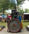 An antique gas engine at an agricultural fair in kentucky