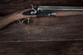 Antique 12-gauge break-action smooth-bored shotgun