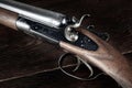 Antique 12-gauge break-action smooth-bored shotgun