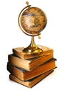 Antique globe on books