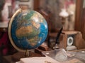 An antique globe on a desk Royalty Free Stock Photo