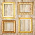 The antique gold frame on wooden wall background Royalty Free Stock Photo