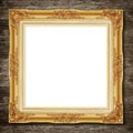 The Antique gold frame on wooden wall background Royalty Free Stock Photo