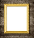 The Antique gold frame on wooden wall background Royalty Free Stock Photo