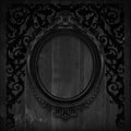 The Antique gold frame on wooden wall;. Empty Antique gold picture frame on wooden wall. Royalty Free Stock Photo