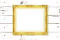 Antique gold frame on wooden wall Royalty Free Stock Photo