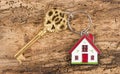 Antique golden house key on keyring Royalty Free Stock Photo