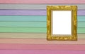 Antique golden picture frame on wood texture Royalty Free Stock Photo