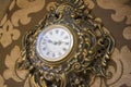 Antique goldish clock.