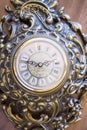 Antique goldish clock. Royalty Free Stock Photo