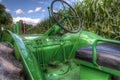 Antique Green John Deere Tractor in Corn Field