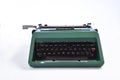 antique green typewriter, analogical typing.