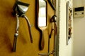 Antique hair cutting scissors and mirror as wall decoration in barber shop
