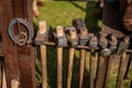 8 antique hammers of various shapes and horseshoe