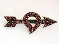 Antique heart and arrow brooch