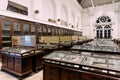 Antique and historical objects place and exhibit inside cabinet in The Indian Museum at Kolkata, India