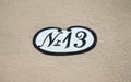 Antique house number 13 Royalty Free Stock Photo