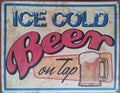 Antique Ice Cold Beer on Tap tin sign Royalty Free Stock Photo