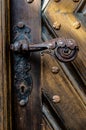 Antique iron forged door handle from the front door Royalty Free Stock Photo