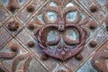 Antique iron handle on an iron door Royalty Free Stock Photo