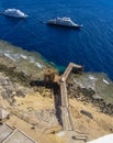 antique iron and wooden pier in front of the lighthouse on Big Brother Island, Red Sea, Egypt Royalty Free Stock Photo