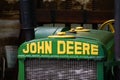 Antique John Deere tractor with its iconic logo