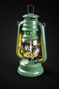 Antique kerosene lamp with flame isolated on black background 3d