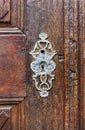 Antique keyhole on old paneled wooden door Royalty Free Stock Photo