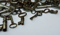 Antique Keys Background with White Copy Space. Royalty Free Stock Photo