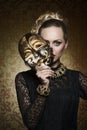 Antique lady with gothic mask