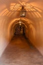 Antique lamps chandeliers in the cave dungeon Royalty Free Stock Photo