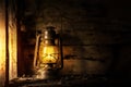 Antique lantern kerosene on an old overgrown wood