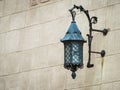 Antique lantern on a stone wall Royalty Free Stock Photo