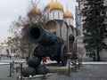 Antique large cannon and cannonballs outside cathedral Moscow Russia