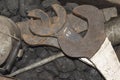 Antique large rusty wrenches. Old locomotive train toolset with heavy-duty spanners