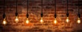 Antique light bulbs on brick background Royalty Free Stock Photo