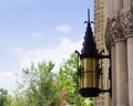 Antique light on side of church